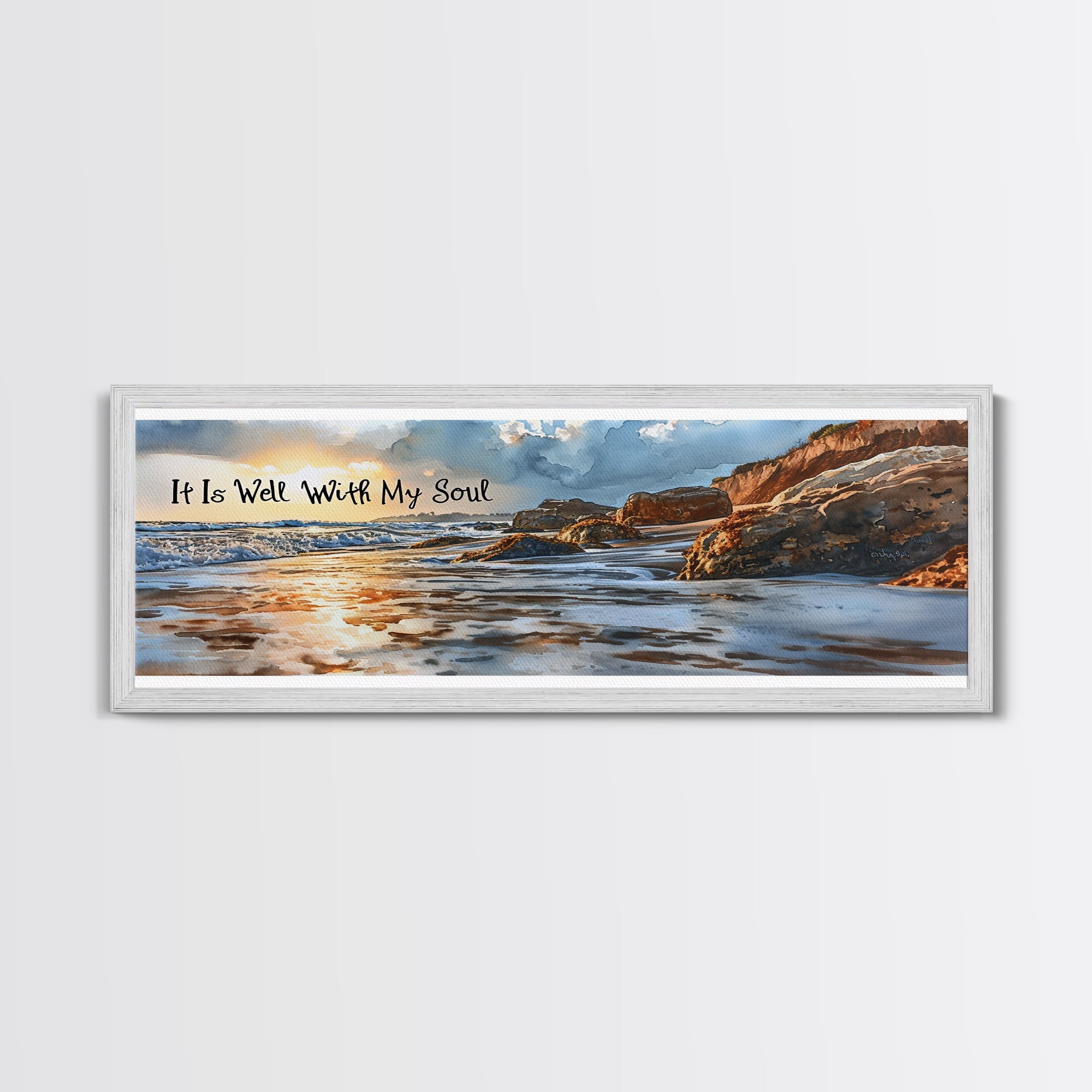 Coastal beach wall art canvas in white frame with scripture text and rocky shoreline