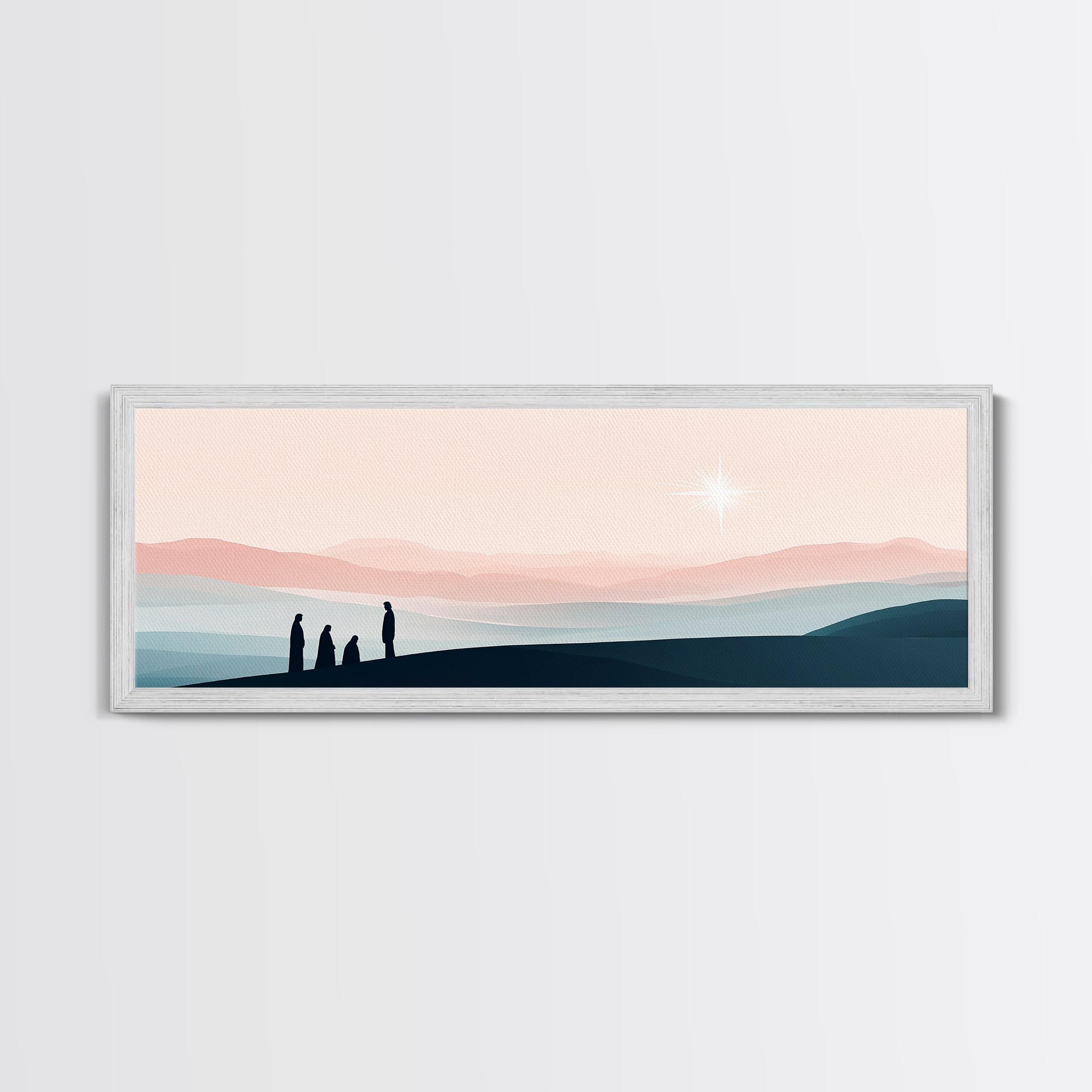 Gray framed canvas print with silhouetted figures, rolling hills, and a glowing star