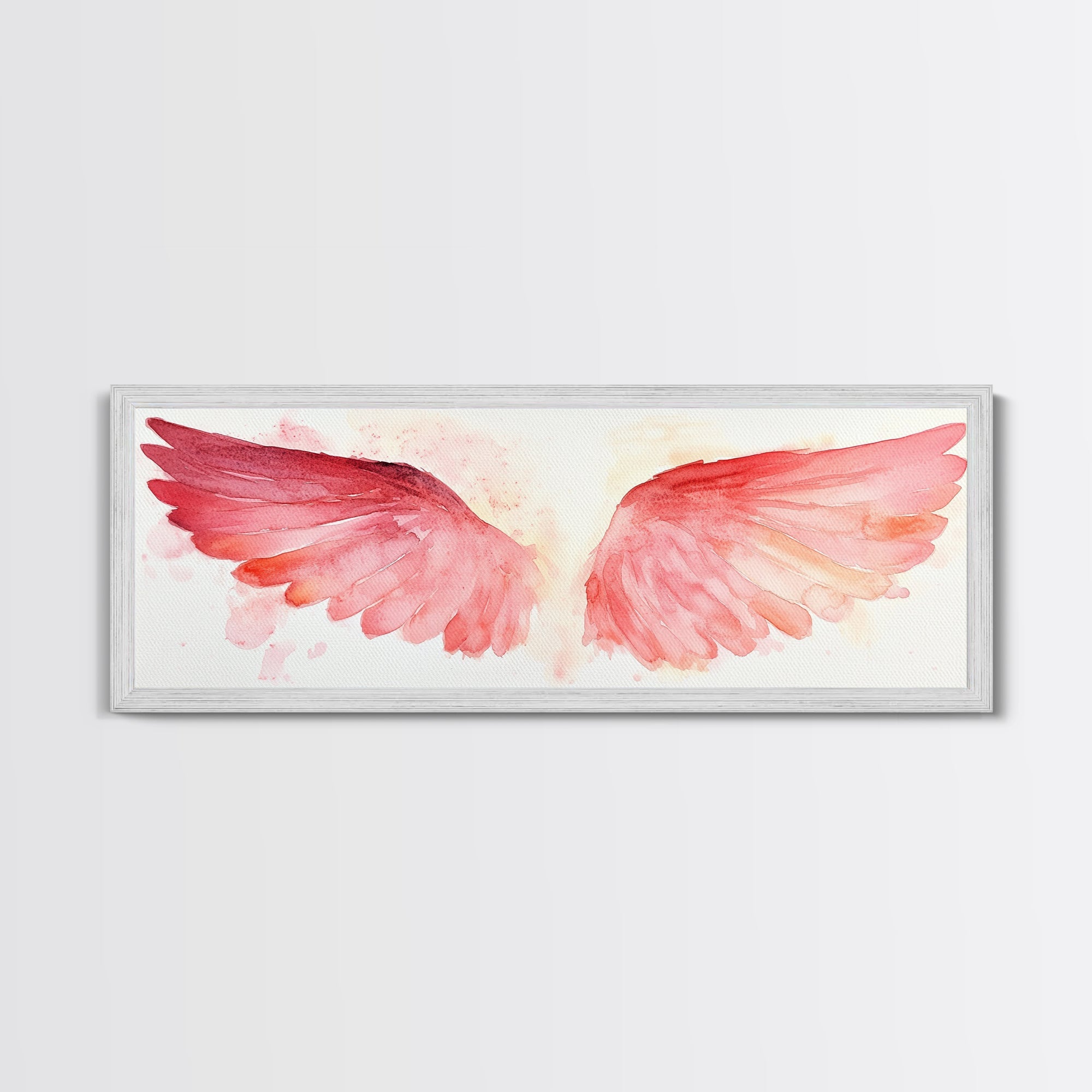 Angel wings canvas print in light gray frame with pink watercolor wings