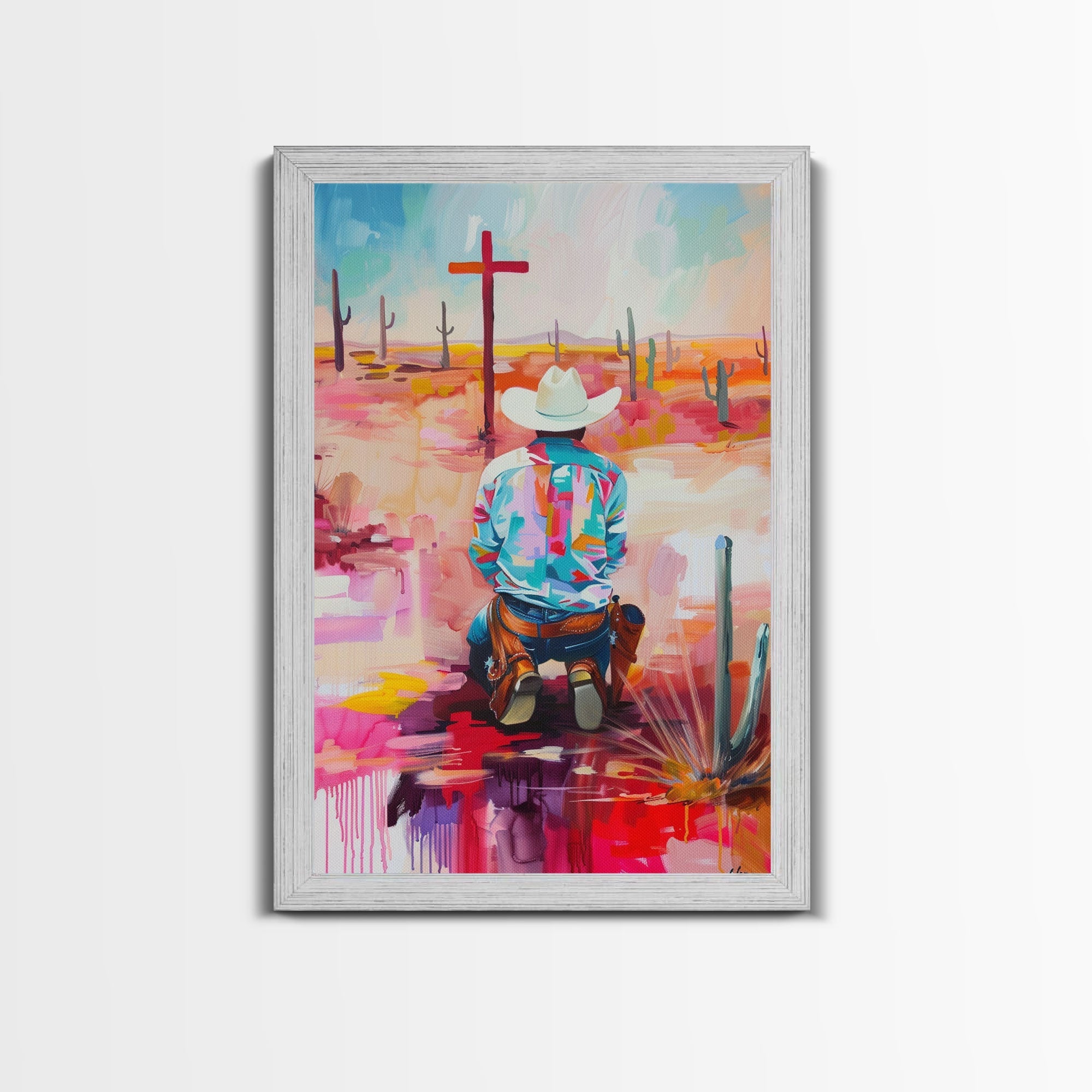 Framed canvas print of an abstract kneeling cowboy in a colorful Southwestern desert scene, gray frame