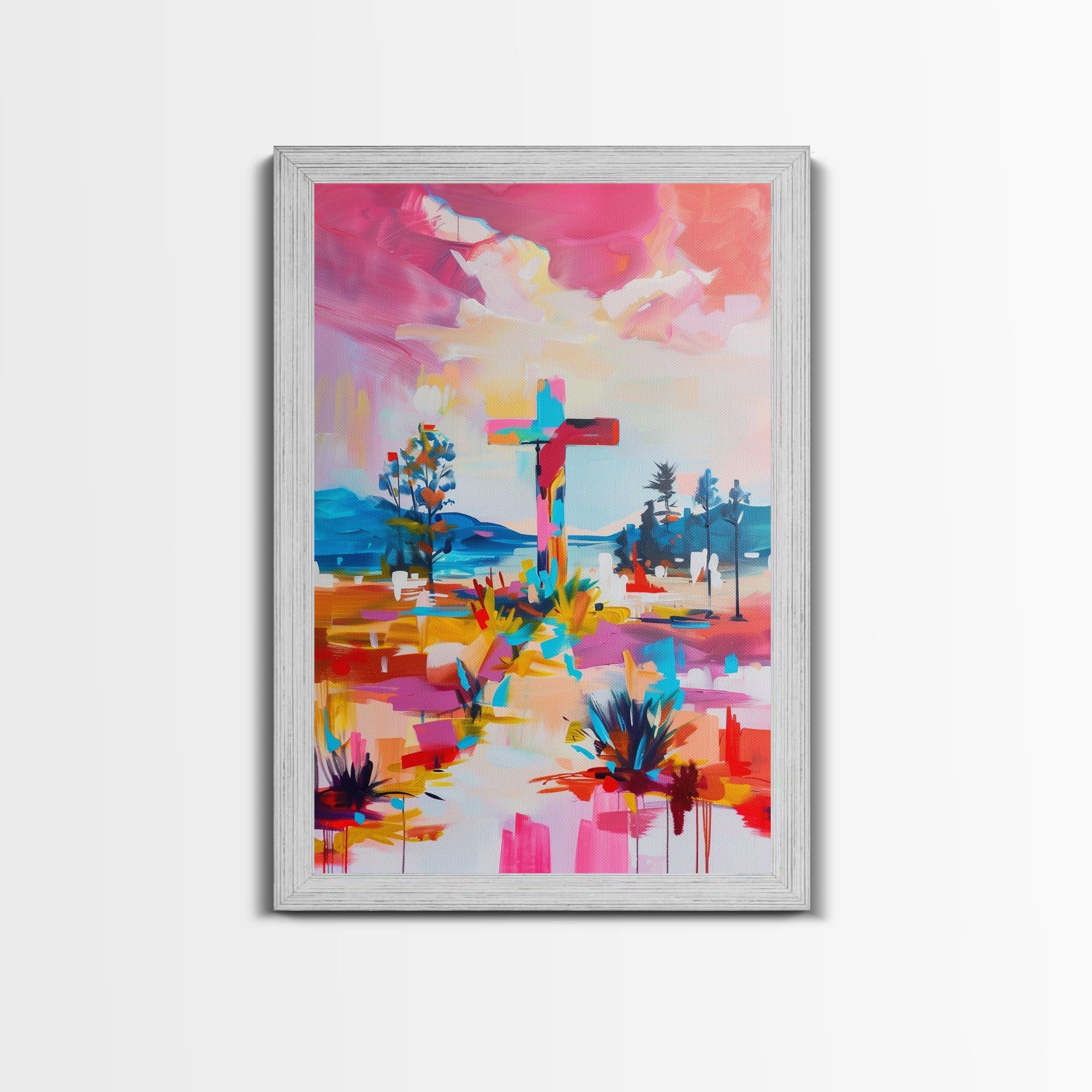 Gray framed canvas wall art featuring a colorful cross over an abstract landscape
