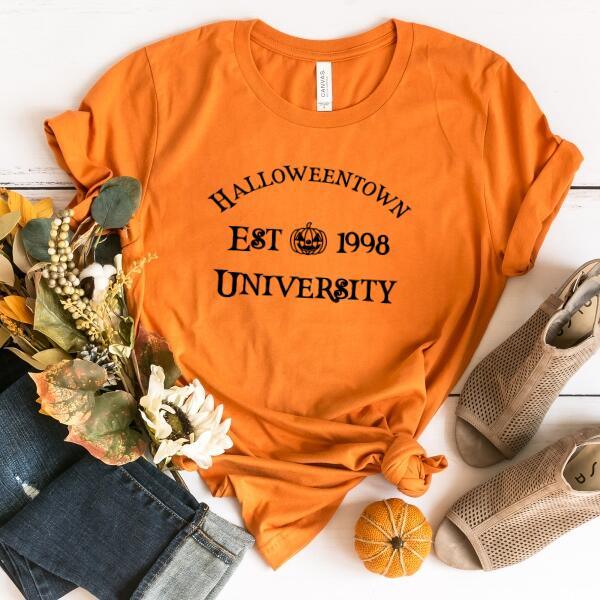 Orange short-sleeve t-shirt with 'Halloweentown EST 1998 UNIVERSITY' graphic