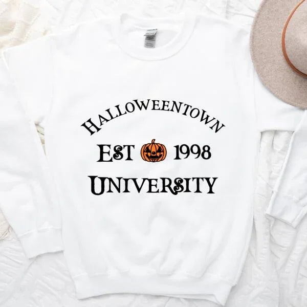 White crewneck sweatshirt with 'Halloweentown EST 1998 UNIVERSITY' graphic