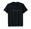 Black crewneck T-shirt with small "JESUS IS KING" text on chest