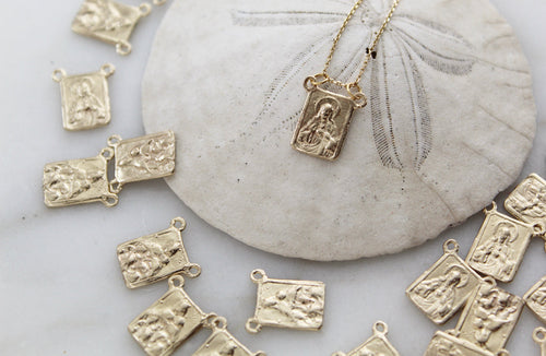 14k gold scapular necklace with small rectangular saint pendant charms on chain