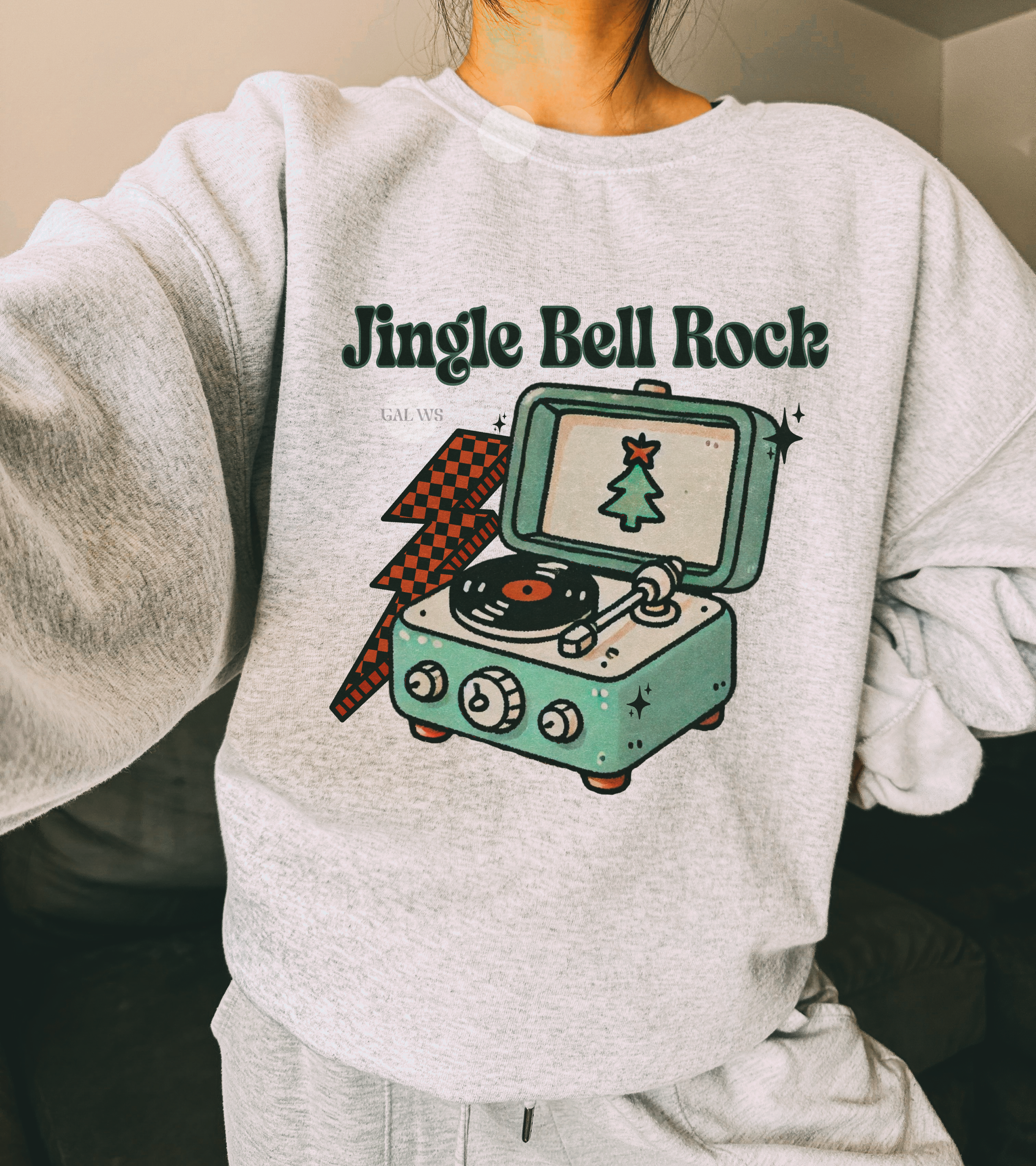 Light gray crewneck sweatshirt with front turntable graphic and Jingle Bell Rock text