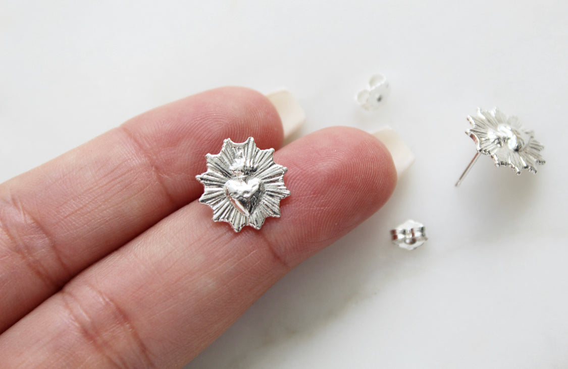 Sacred heart stud earrings, silver-tone starburst heart on posts