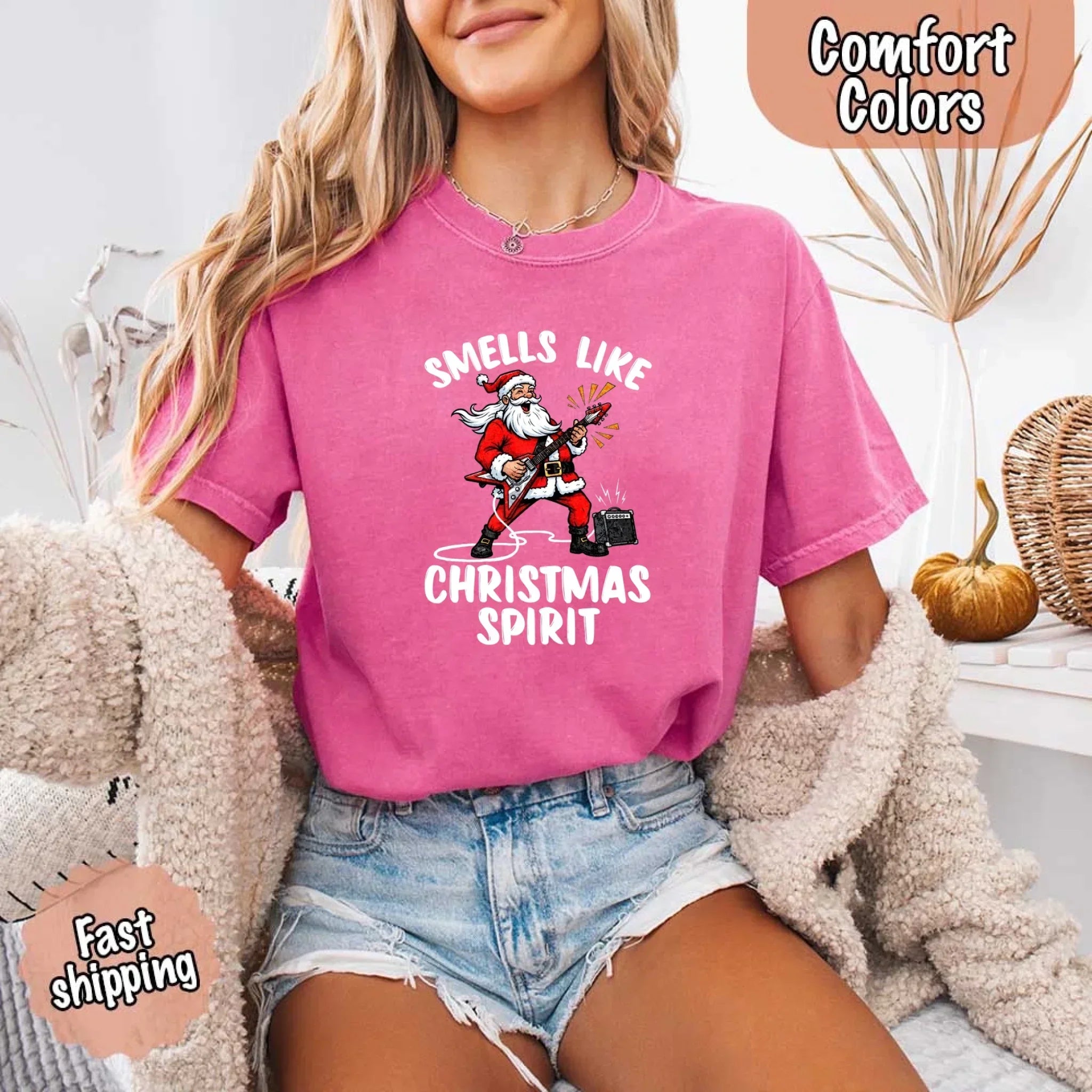 Pink crew-neck T-shirt with Santa graphic and 'Christmas Spirit' lettering