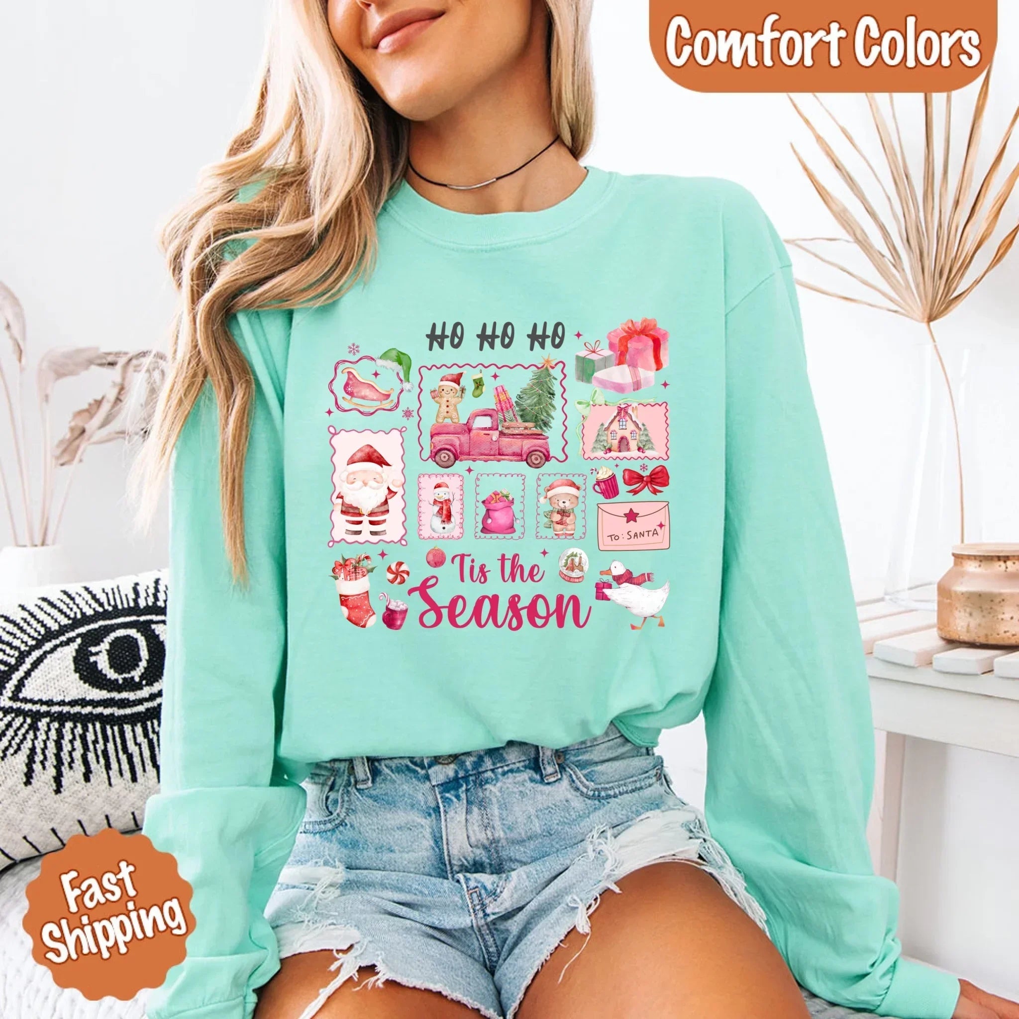 Mint green long sleeve Christmas T-shirt with “Tis the season” holiday graphic on chest