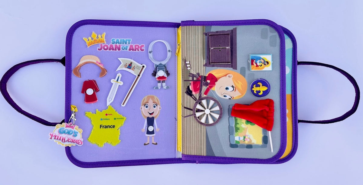 Open busy book page with Saint Joan figure, France map, and movable character pieces