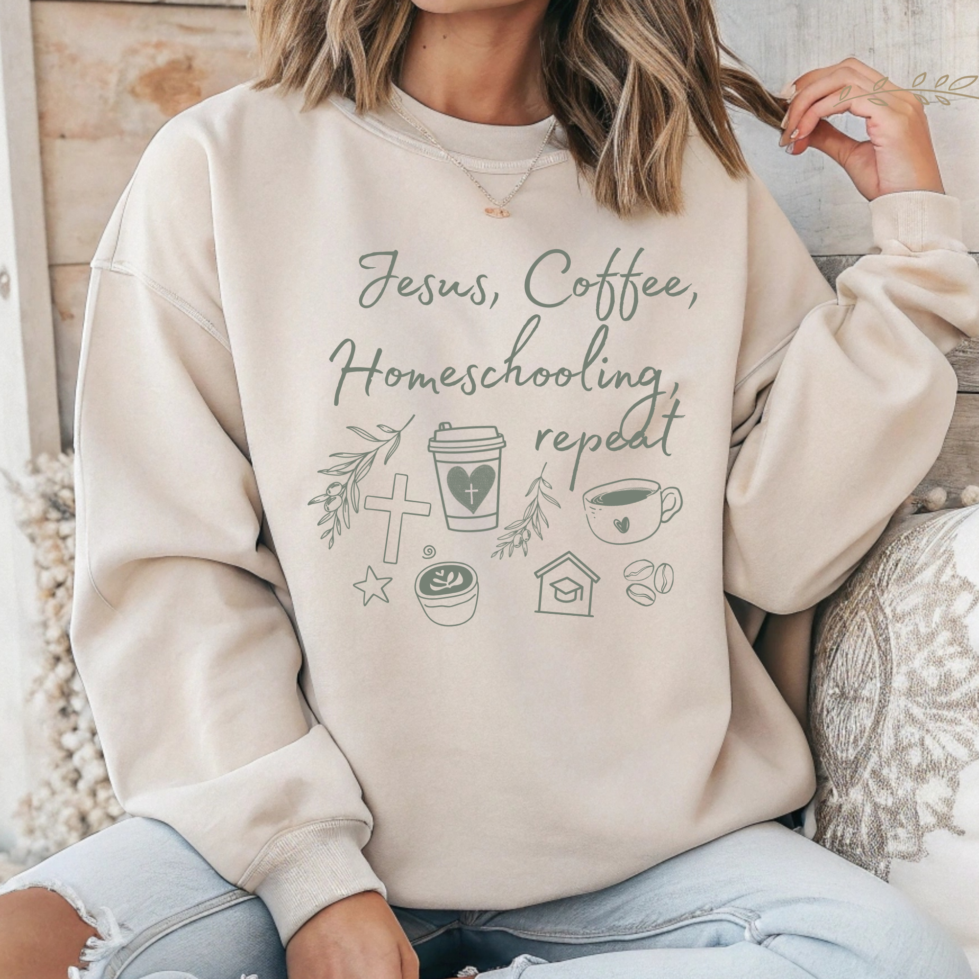 Cream long-sleeve crewneck sweatshirt with green Jesus Coffee homeschooling graphic