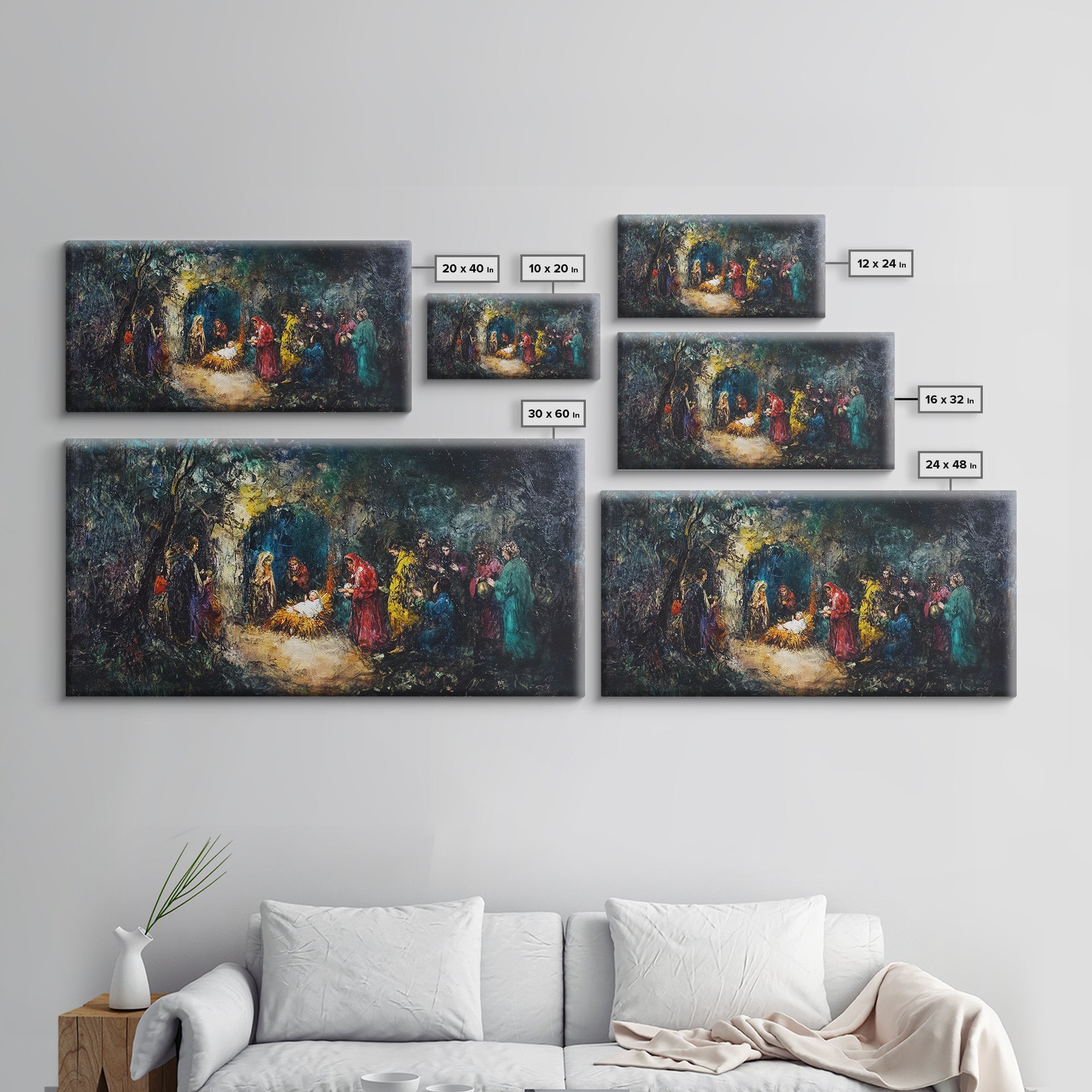 Set of framed abstract nativity canvas prints in varying sizes with colorful figures and glow