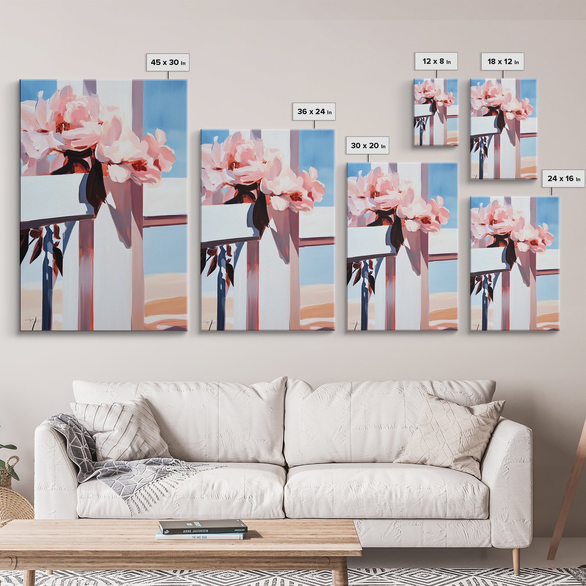 Multiple sizes of framed floral peony cross canvas prints on wall, pink and blue