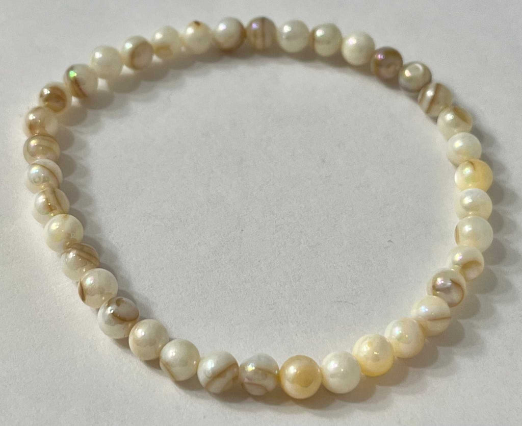 Freshwater pearl bead bracelet with ivory and honey-toned oval pearls