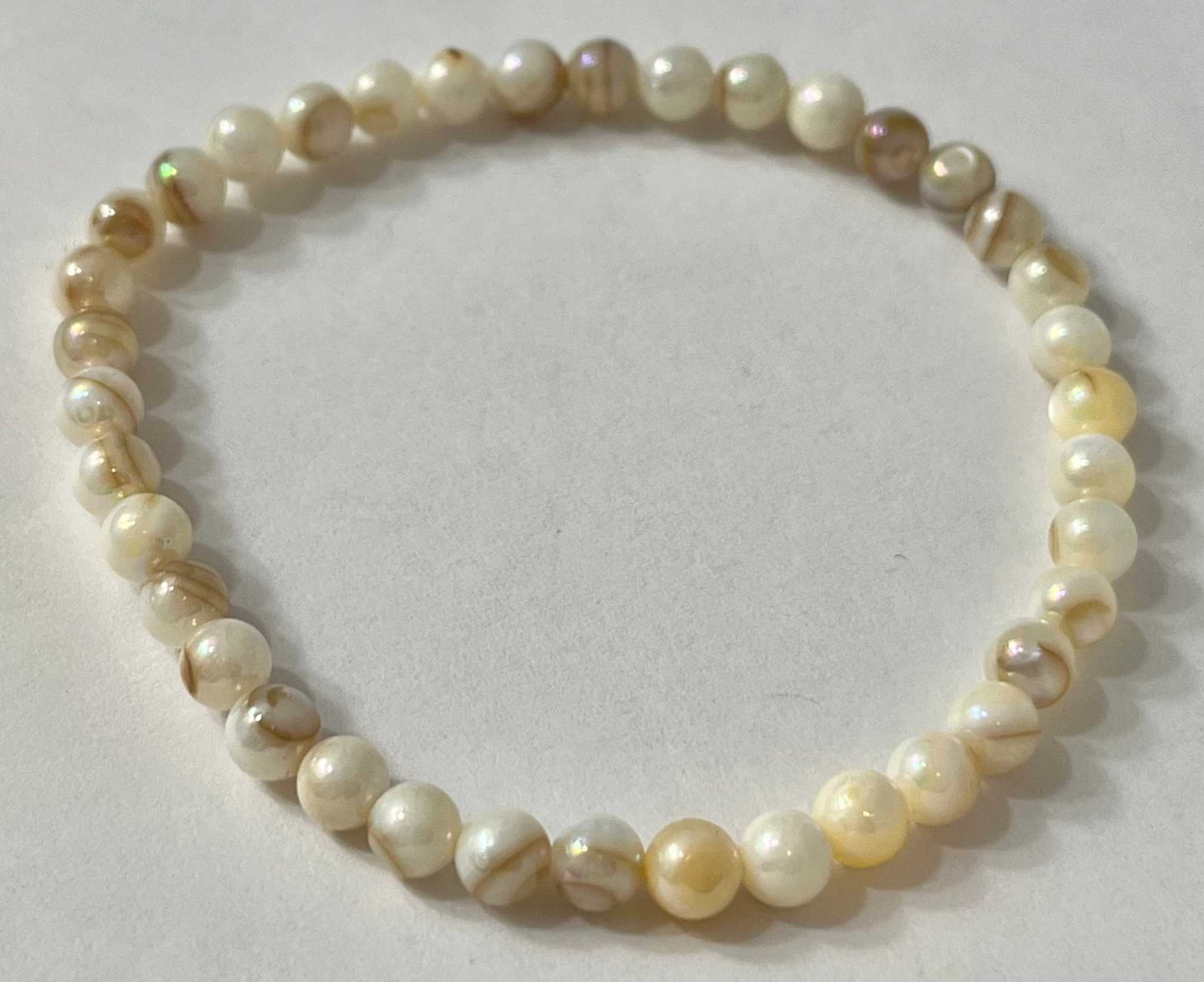 Freshwater pearl bead bracelet with ivory and honey-toned oval pearls