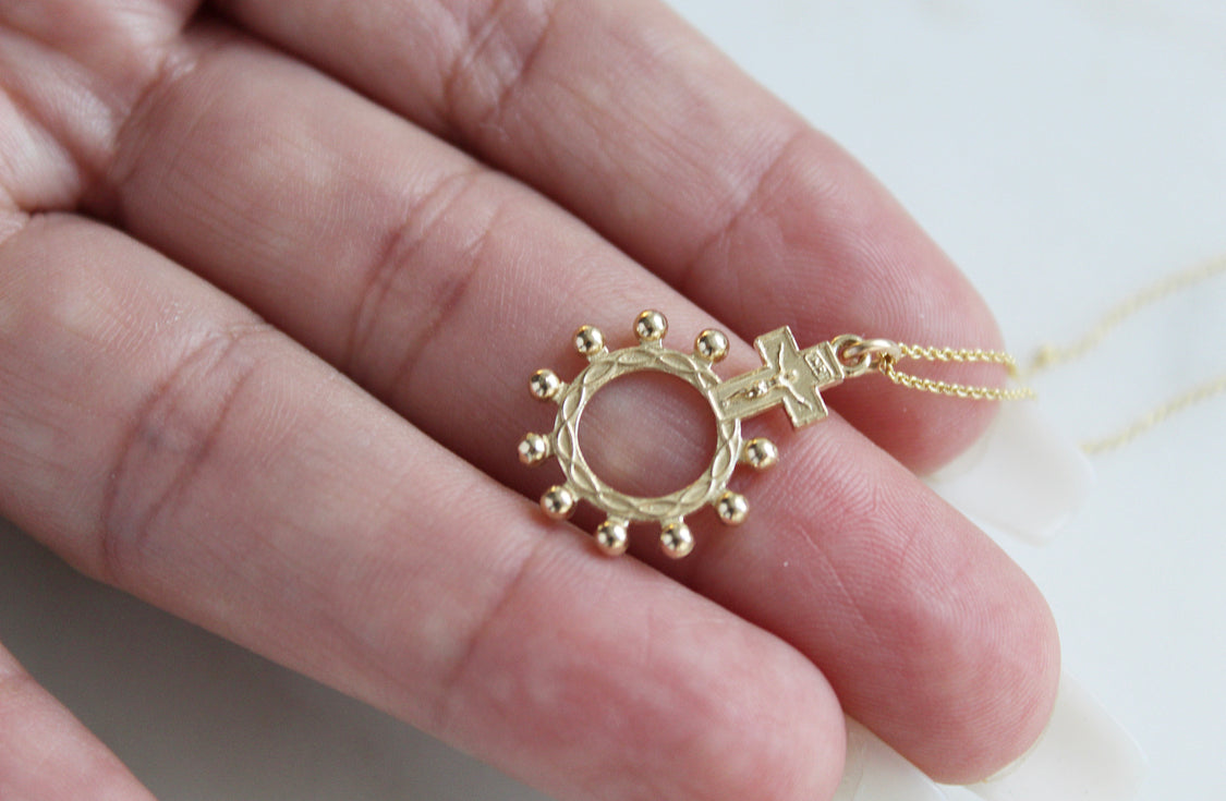 14k gold rosary bead pendant on chain: round ring with bead halo and cross charm