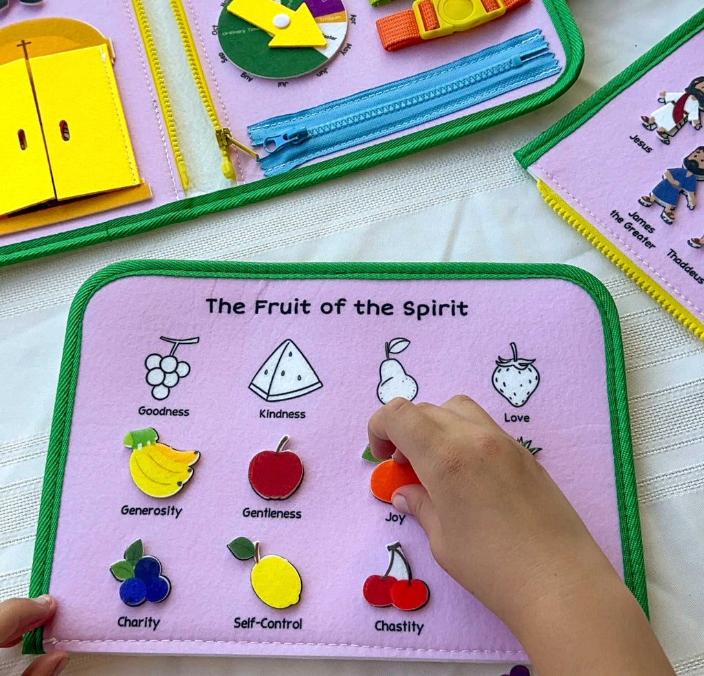 Felt busy book page titled “The Fruit of the Spirit” with category icons