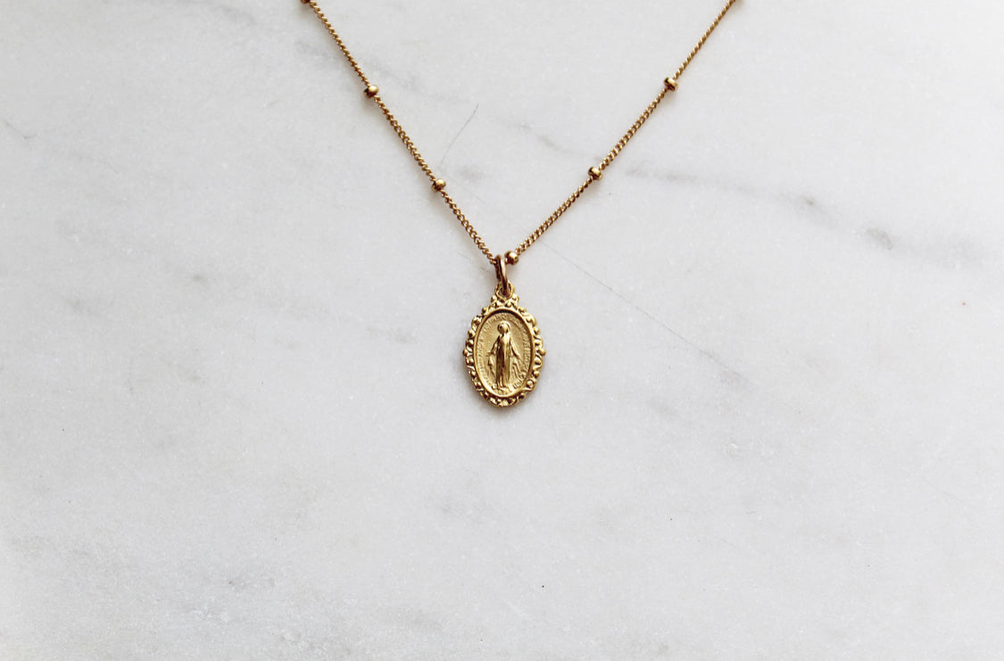 Gold-tone chain necklace with oval Miraculous medal pendant