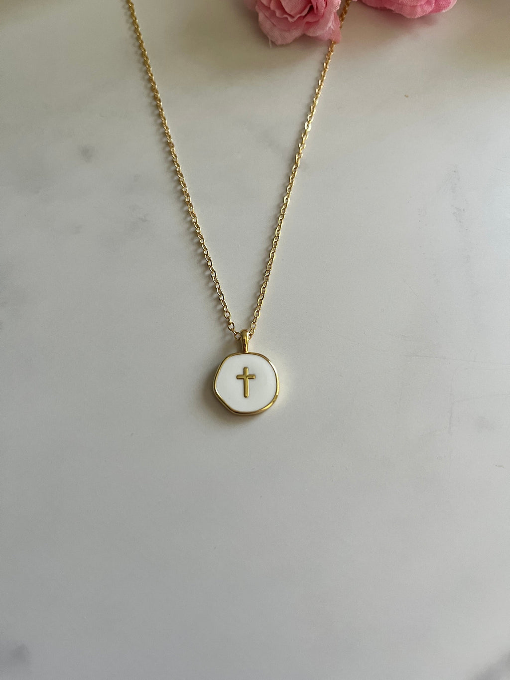 Gold round cross pendant on thin chain