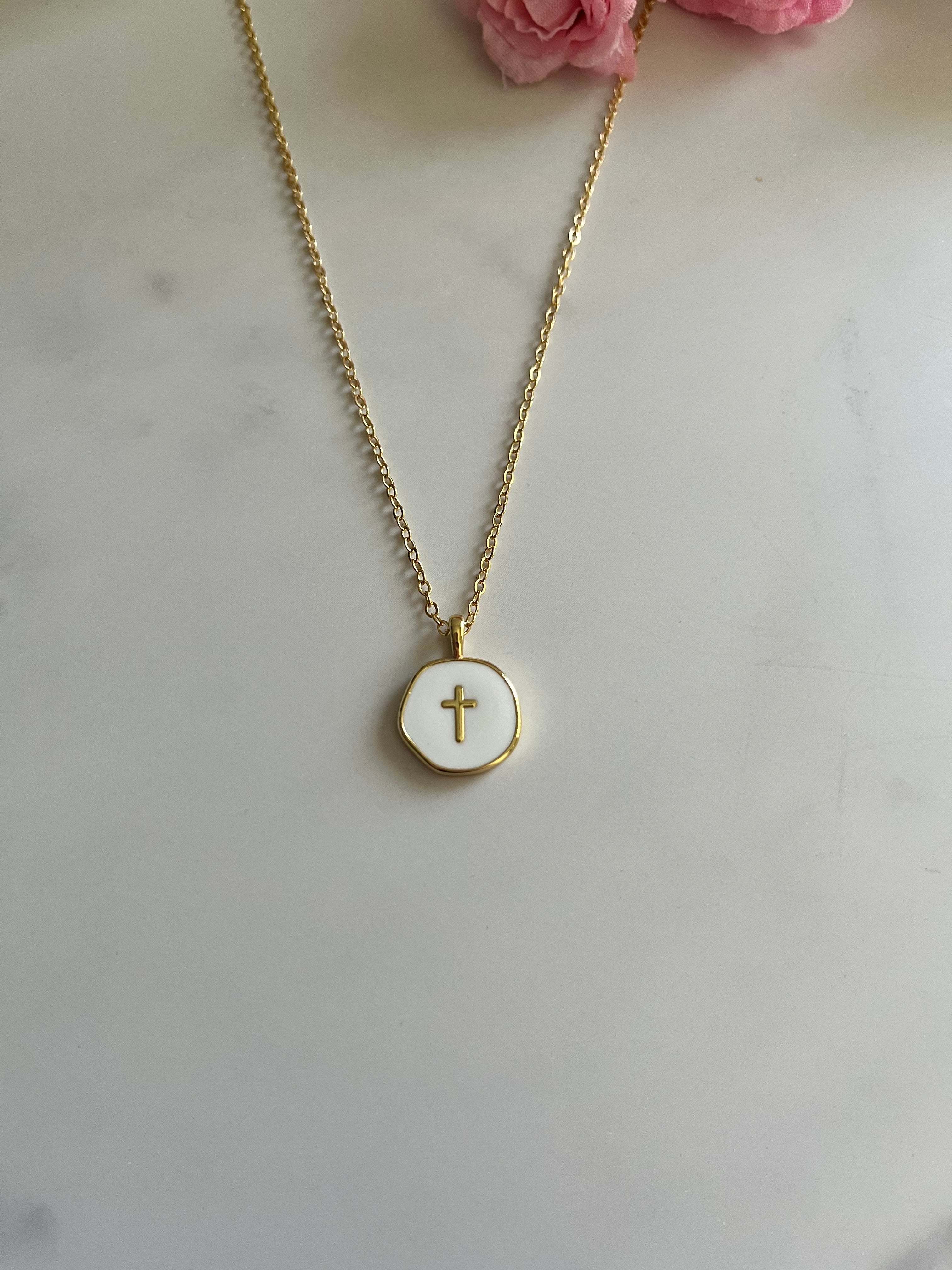 Gold round cross pendant on thin chain