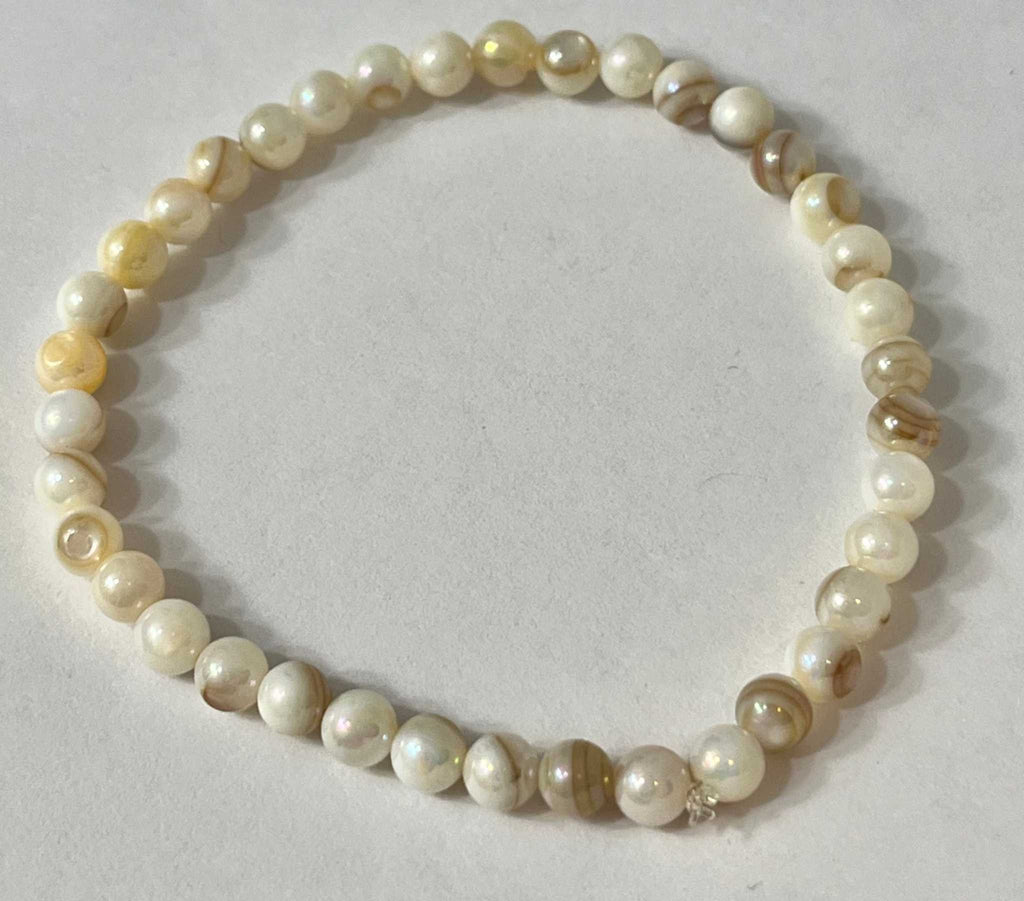 Freshwater pearl bead bracelet with cream and pale gold round pearls