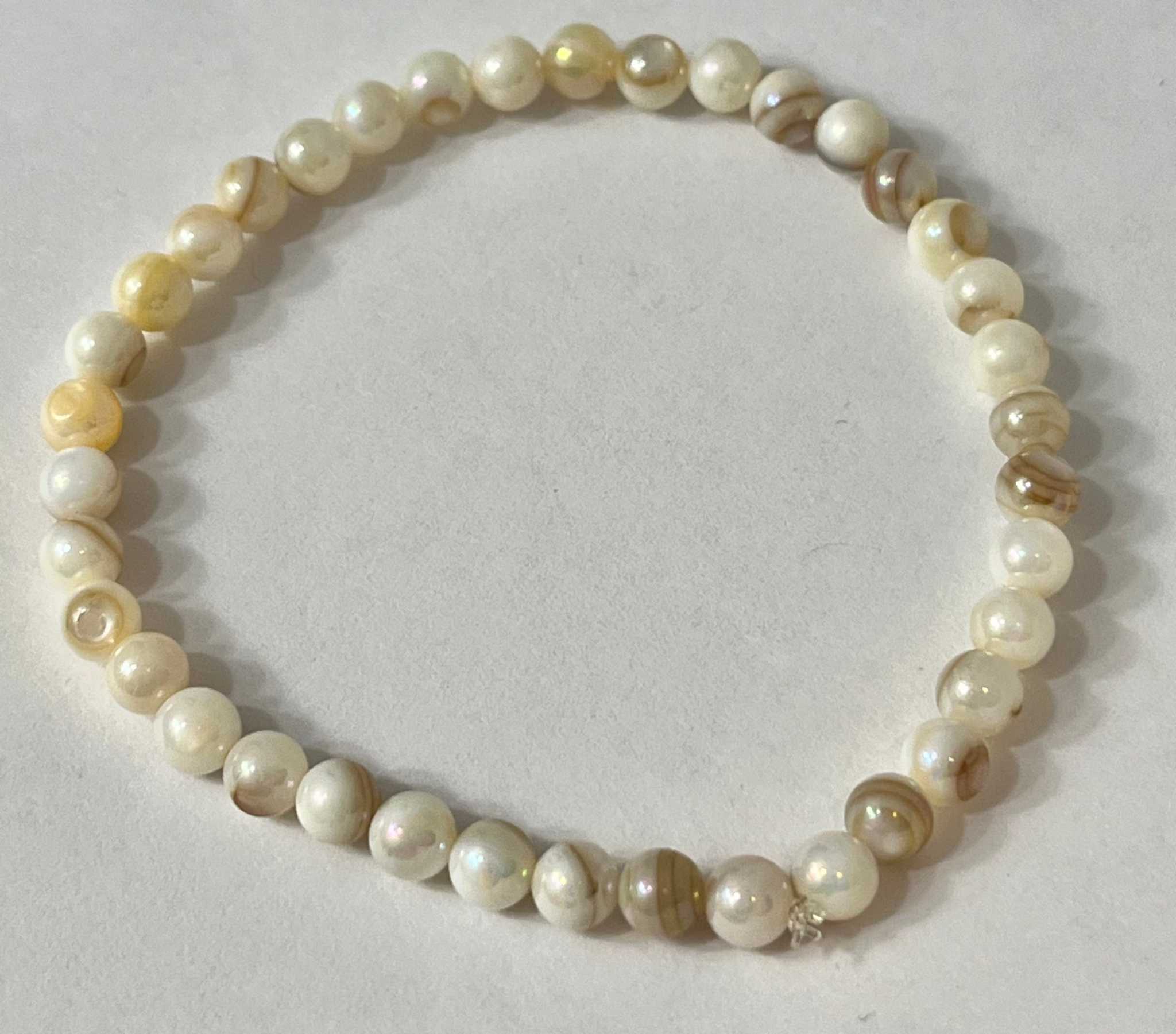 Freshwater pearl bead bracelet with cream and pale gold round pearls