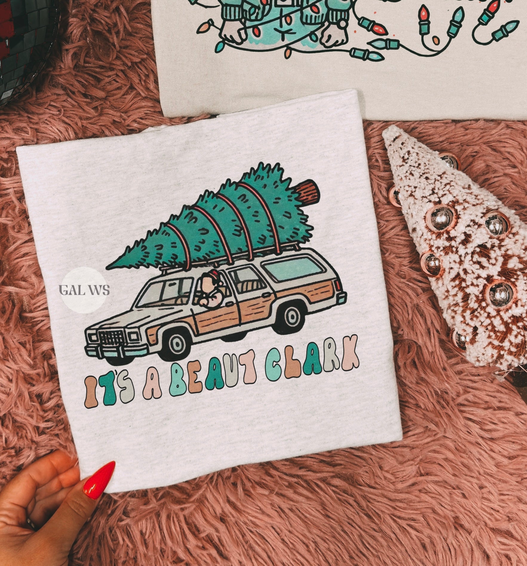 Light gray graphic T-shirt with teal truck and 'its a beaut clark' print