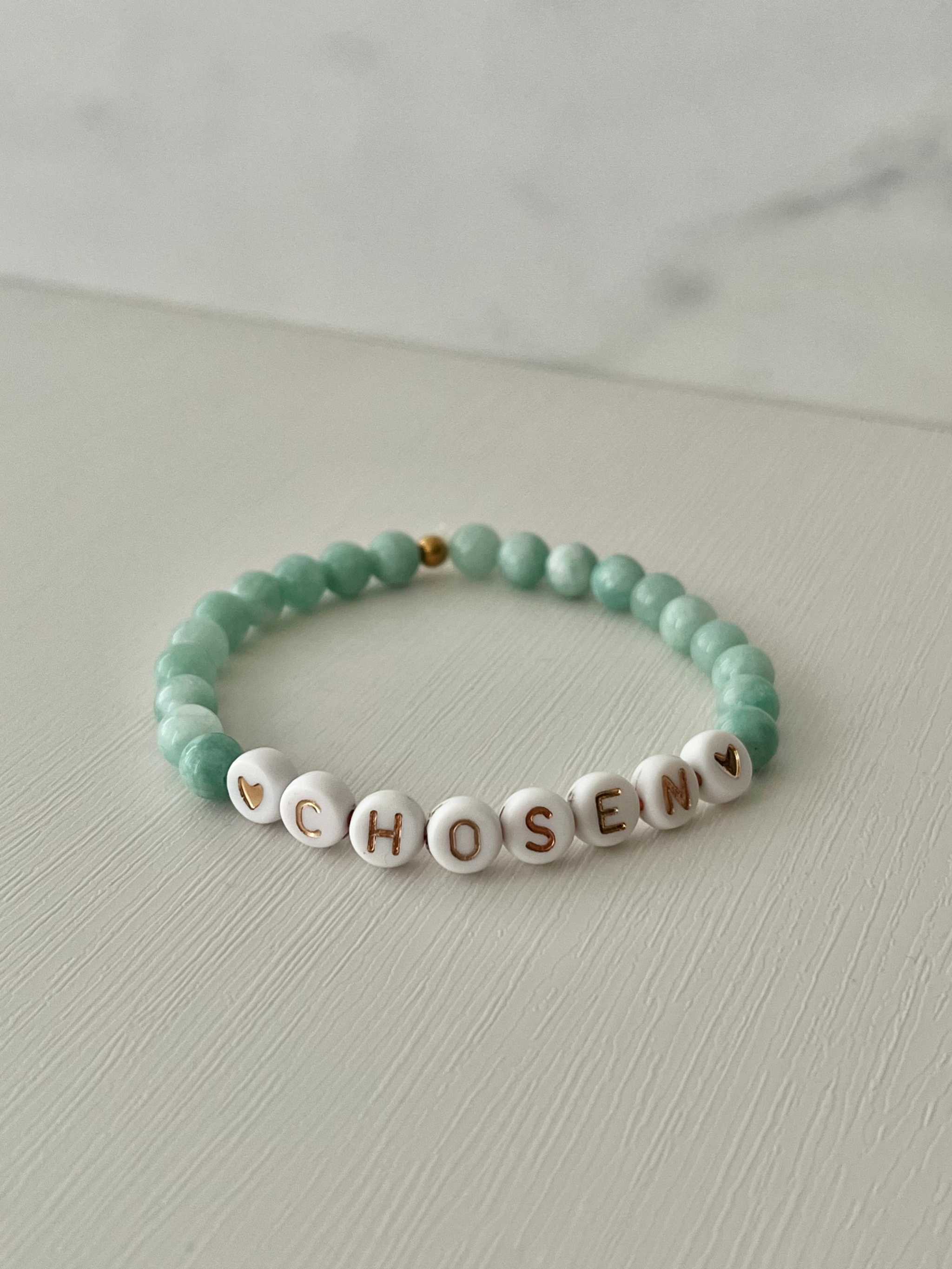 Jade green bead bracelet with white CHOSEN beads and small gold accent