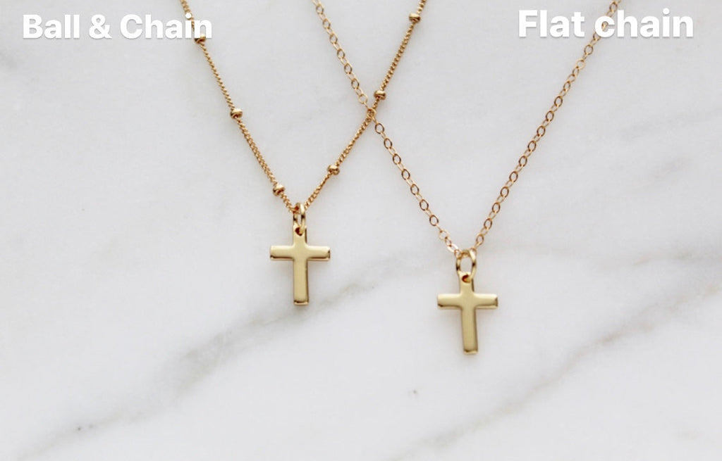 Gold cross pendant necklaces on ball and flat link chains, small cross charms