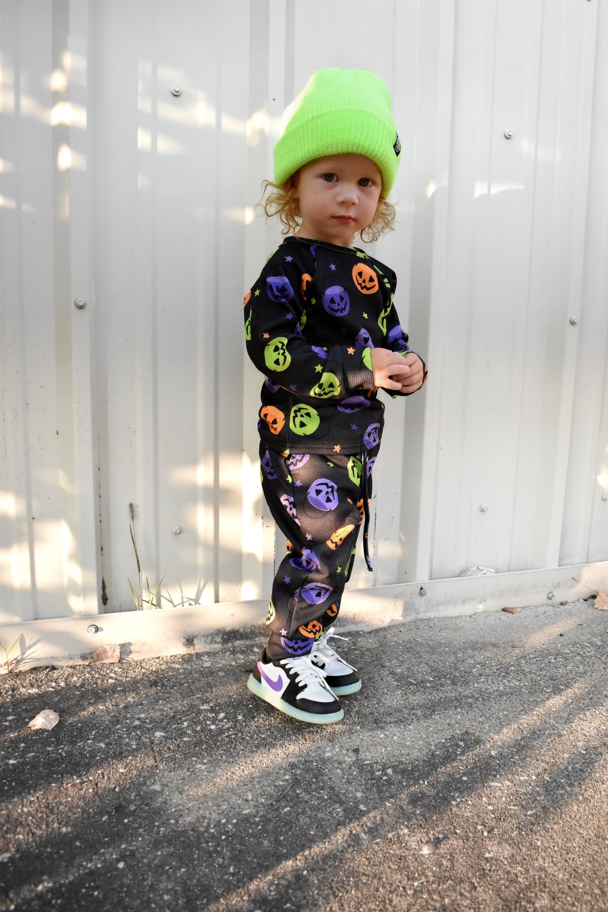 Kids waffle pajama set with long sleeves and pants, dark navy Halloween character print
