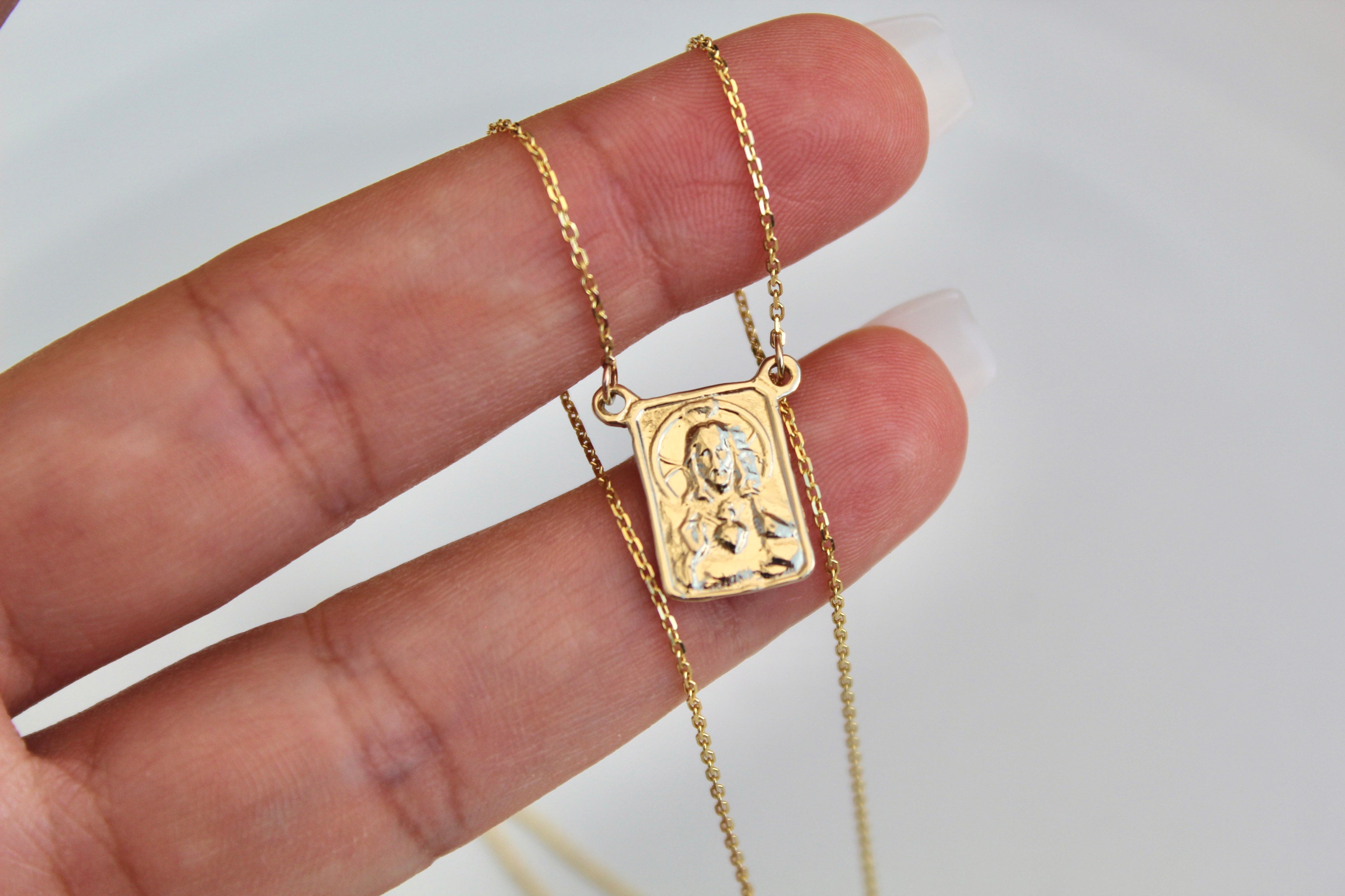 14K gold scapular necklace with small square portrait pendant on thin chain
