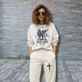 Off-white sweatsuit set with lion graphic sweatshirt and cross logo sweatpants, drawstring waist