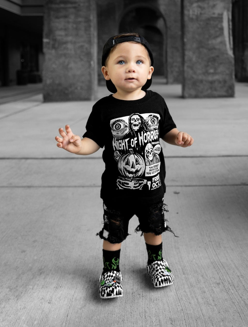 Black kids graphic T-shirt with cartoon monsters and “Night of Horrors” text