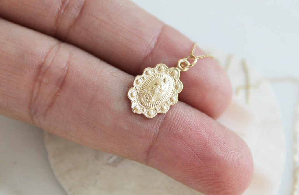 14k gold Our Lady of Guadalupe scalloped pendant detail on chain