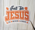 Fall for Jesus sticker: orange JESUS text, autumn leaves, and He never leaves