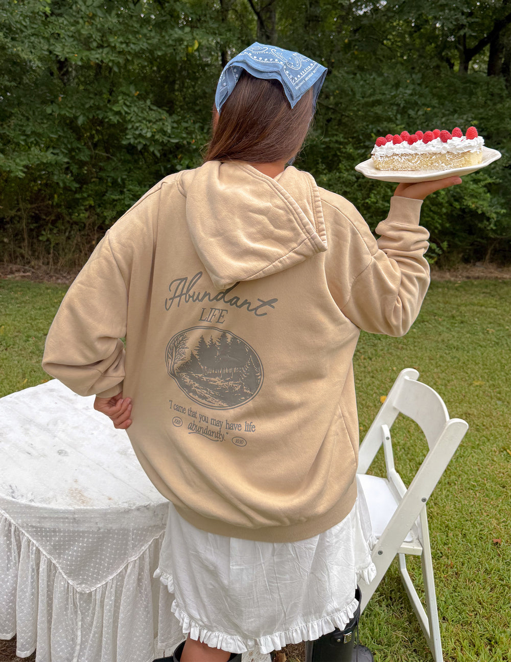 Beige unisex hoodie, back view with large circular graphic and hood