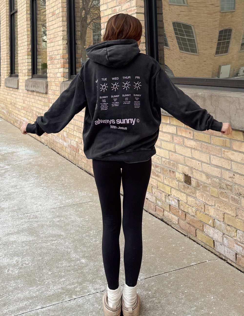 Unisex charcoal hoodie with rear graphic sun icons and “always sunny”, hood and pouch pocket