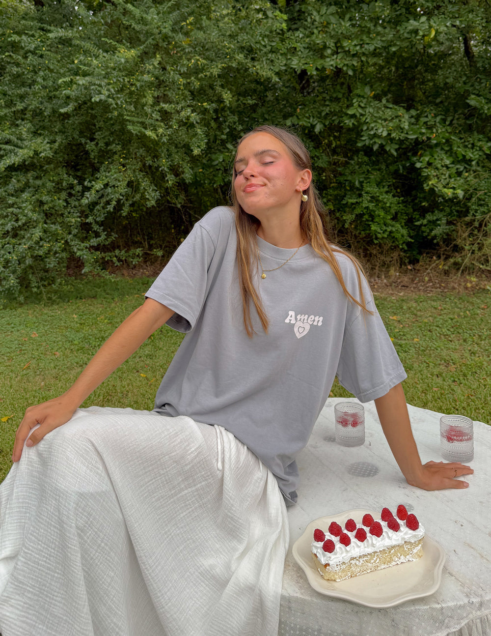 Light gray unisex tee worn with Amen heart logo at chest