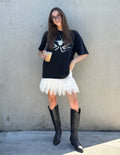 Black heavyweight T-shirt with large white winged angel graphic on front