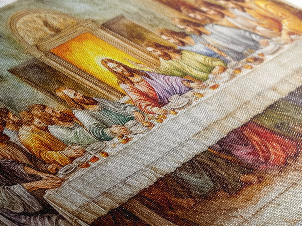 Close-up of canvas print fabric with painted figures and drapery textures