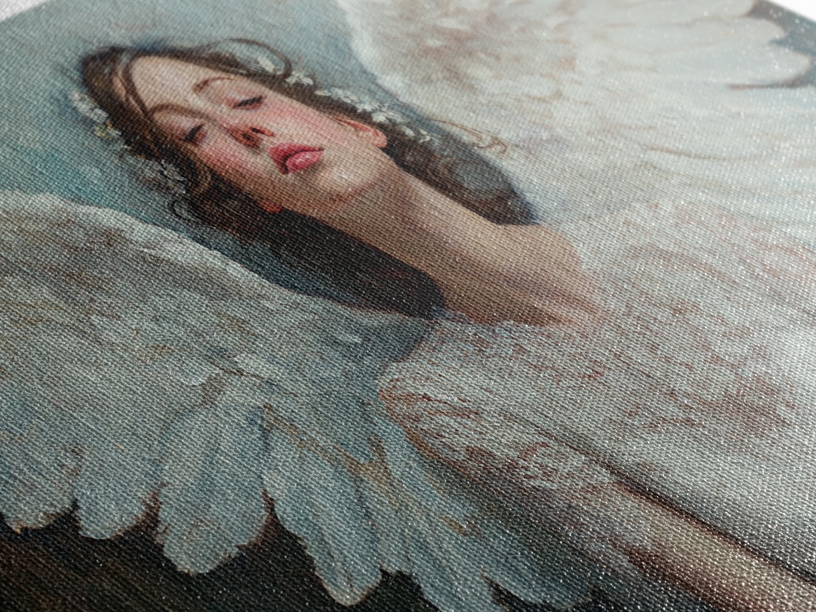 Angel artwork canvas print close-up of woman with white wings, blue background
