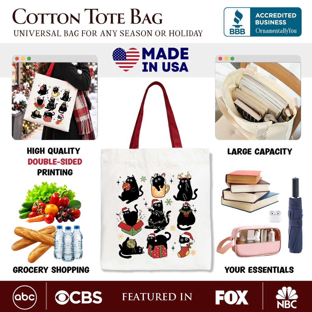 White cotton tote bag with red handles and whimsical black cat holiday artwork