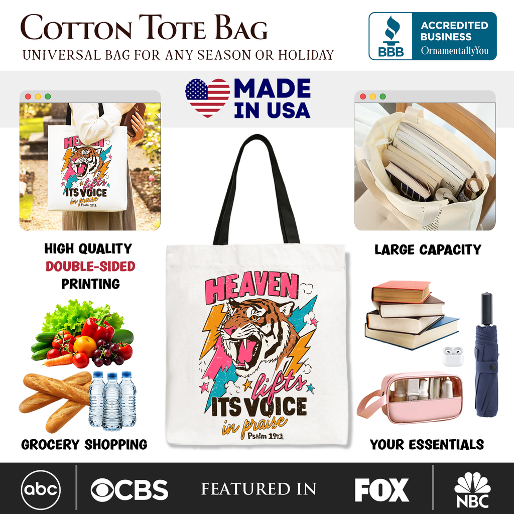 White cotton tote bag with tiger artwork, black handles, and large front print.