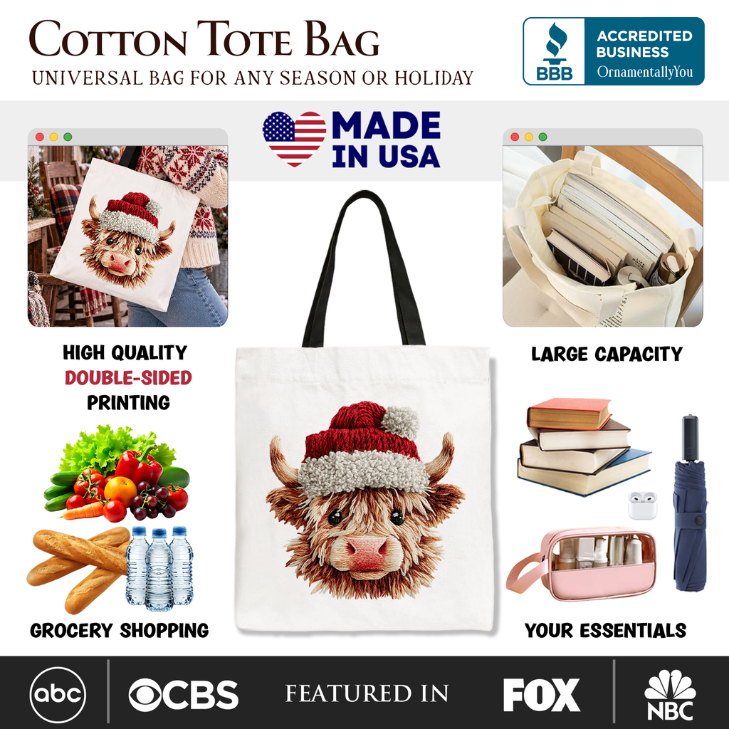Cream tote bag with Highland cow Santa hat graphic and black handles