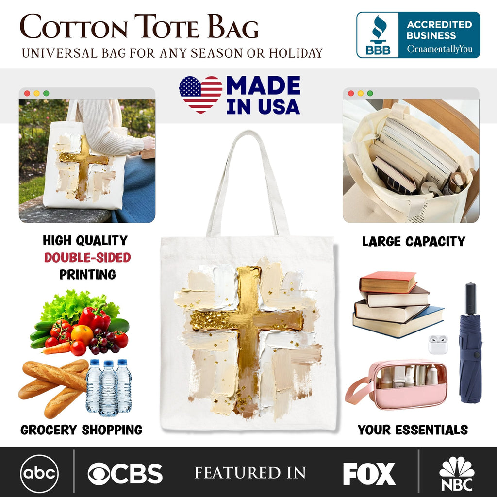White cotton tote bag with gold cross on front, wide strap view