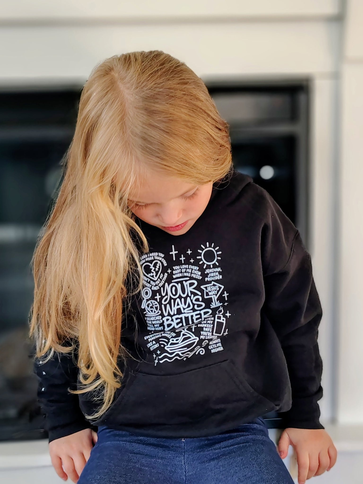 Black kids hoodie with front graphic print and attached hood