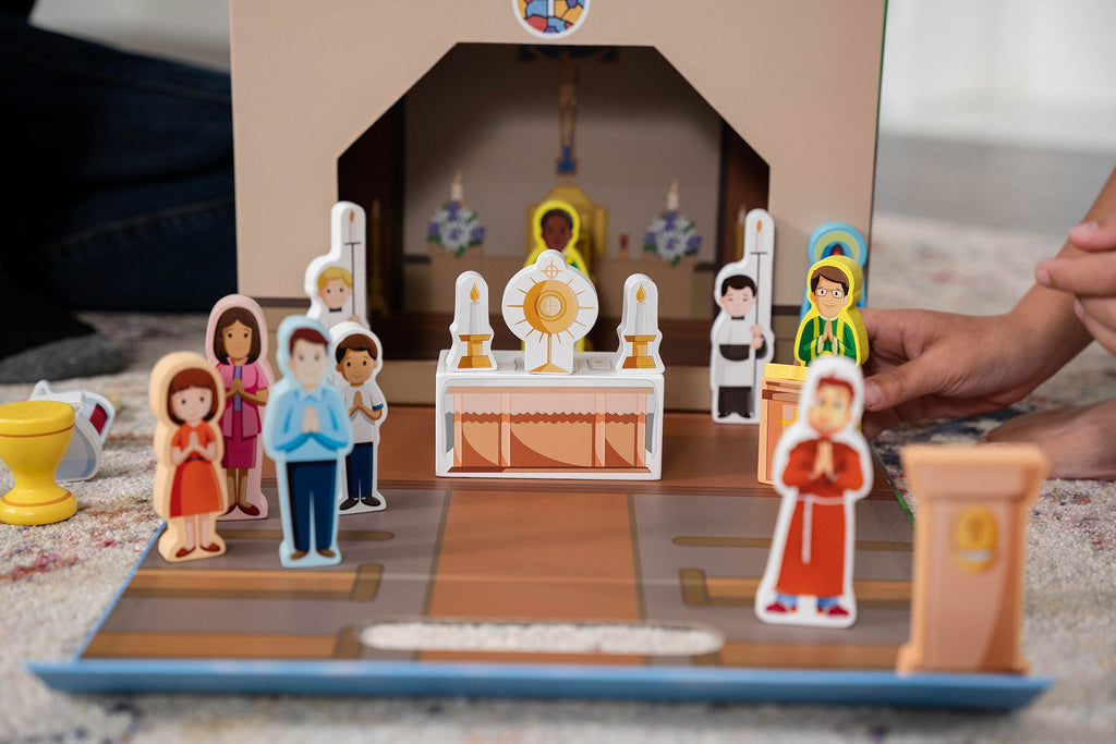 Mini church scene with standing figurines, altar, and accessory pieces on mat