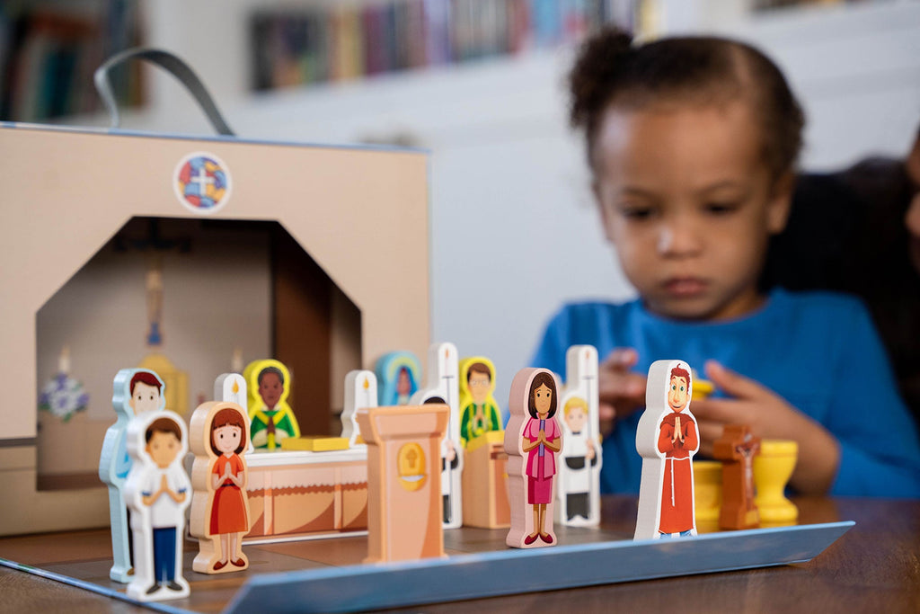 Church playset close-up with colorful standing figures and altar pieces
