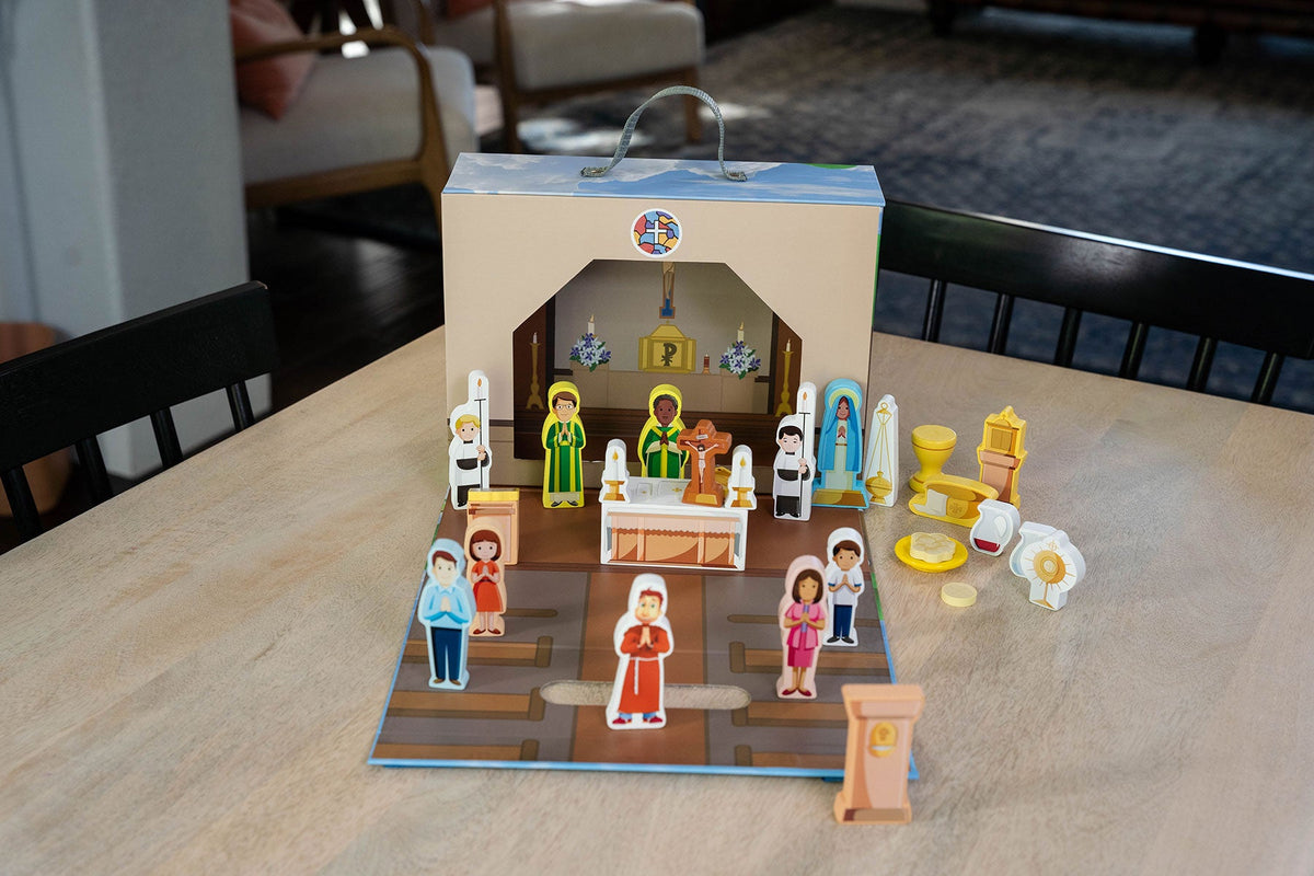 Church playset open on table with colorful character figures and altar setup