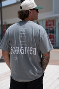 Gray premium tee with back FORGIVEN lettering graphic and small emblem, crew neck short sleeves